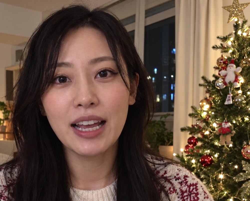 Megan Hayashi in her living room by her Christmas tree